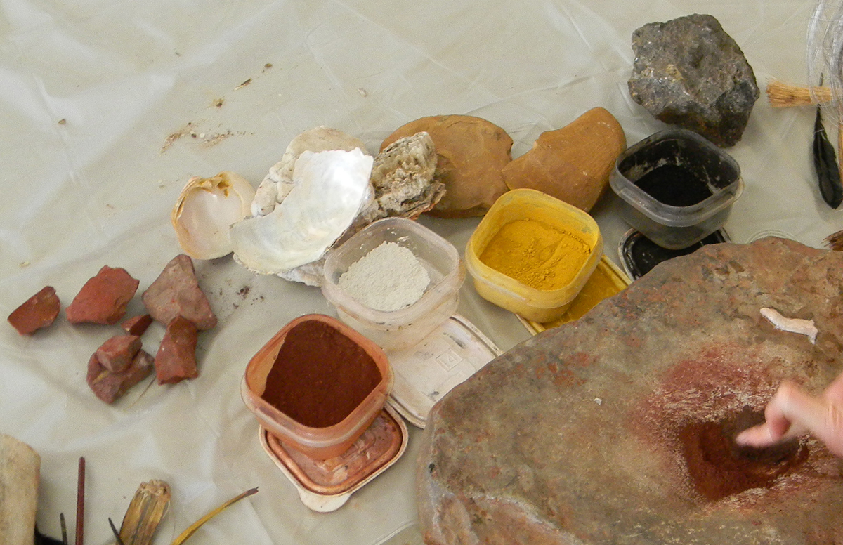 A variety of minerals were ground into a fine powder to produce red, black, yellow, and white pigments.
