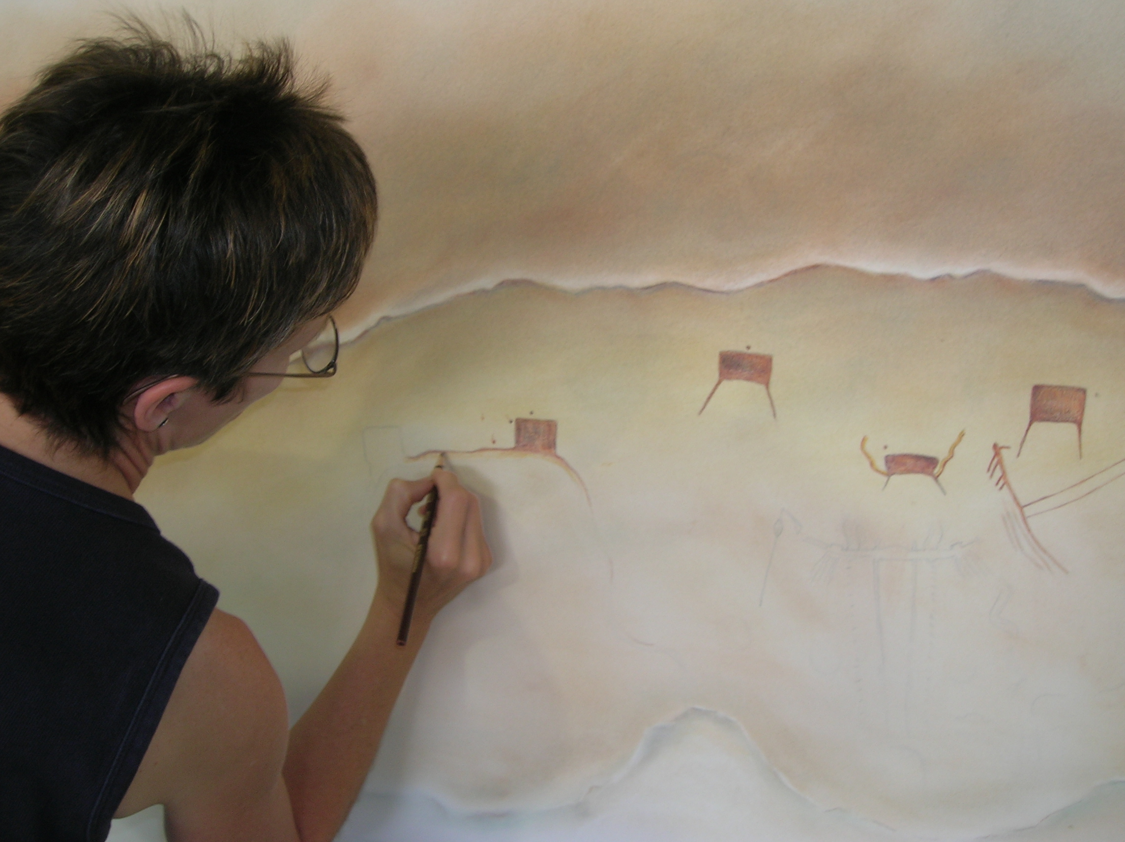 Carolyn creating a full panel rendering of Red Beene Shelter during the 2006 Field Methods in Rock Art field school.