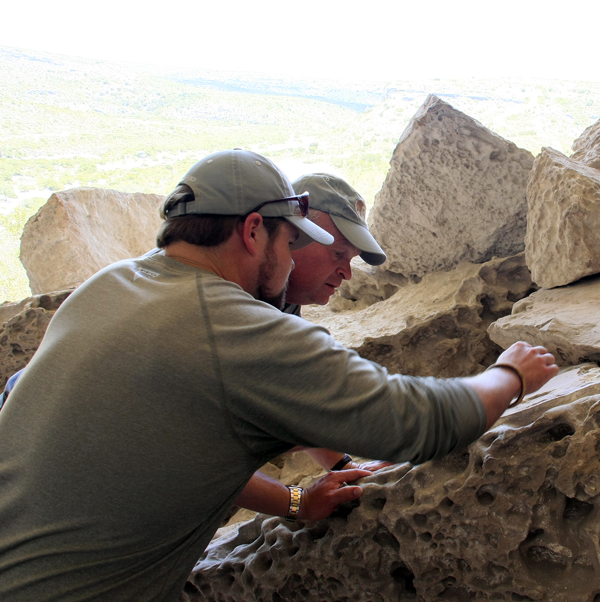 Stan and Ross Studer examine some of the petroglyphs.