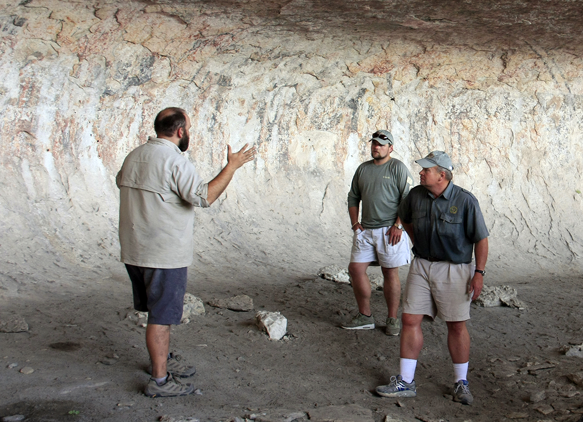 Jerod discusses the pictographs with Stan and Ross.