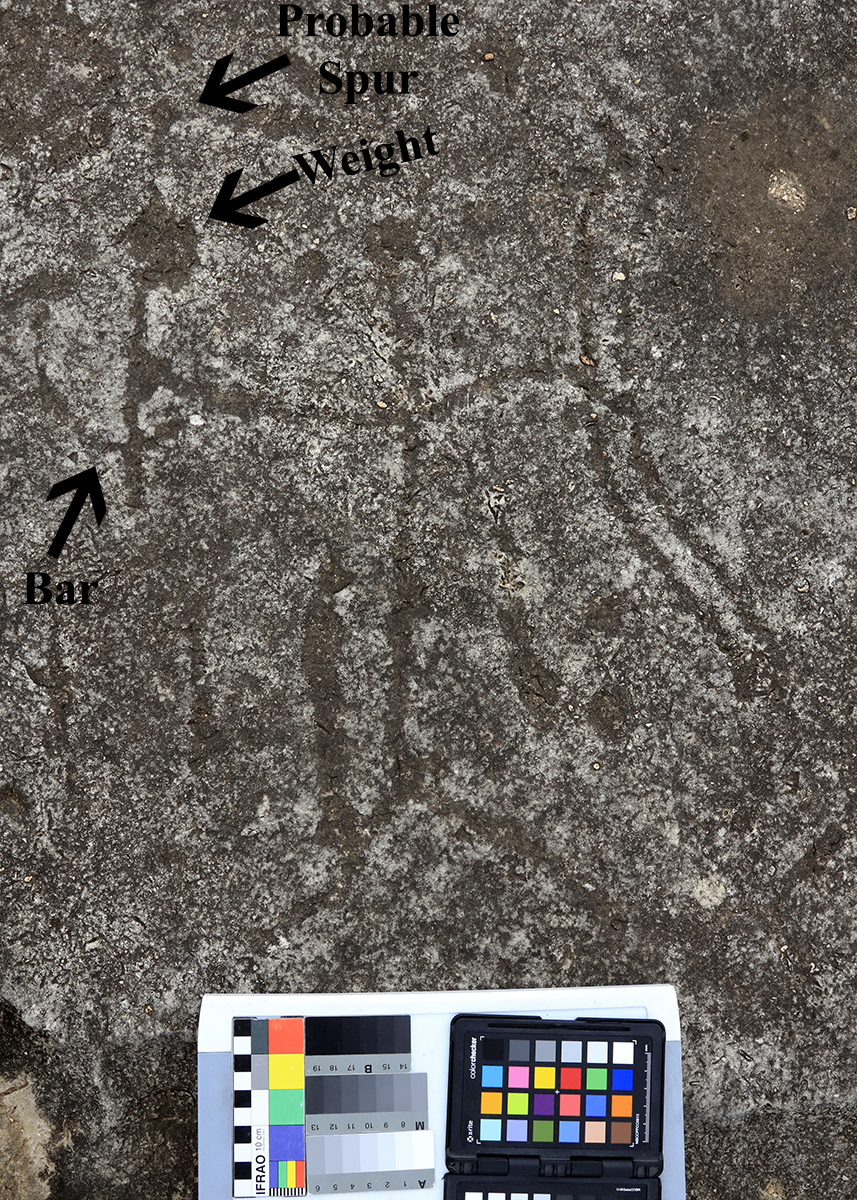 Although not as common as "floating" atlatls, some atlatls at the Lewis Canyon Petroglyph site are wielded by anthropomorphic figures. Notice the similarities between this figure and the Red Linear style figures shown above.