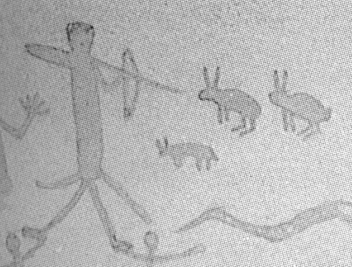 Red Monochrome anthropomorph wielding a bow and "shooting" at several zoomorphs (Figure I) as illustrated by Kirkland.
