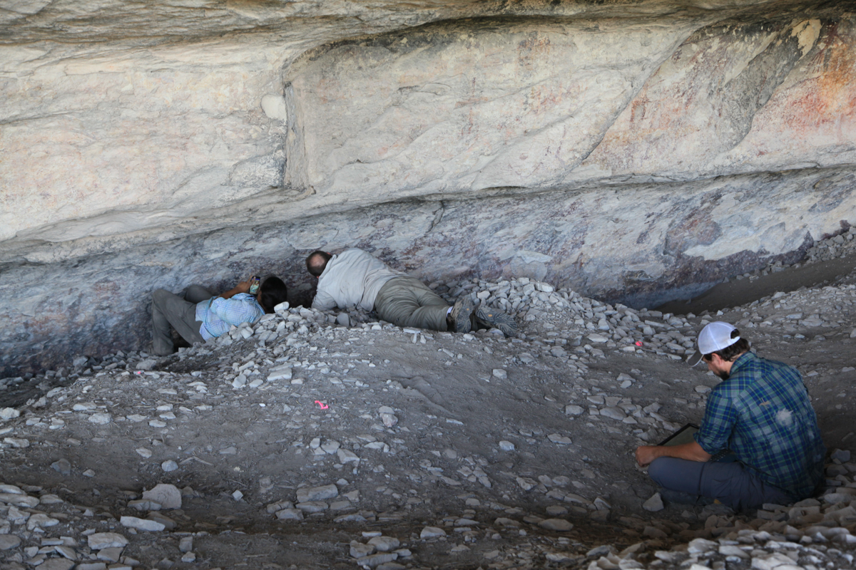 Charles, Vicky, and Jerod working together on the Rock Art Site Form