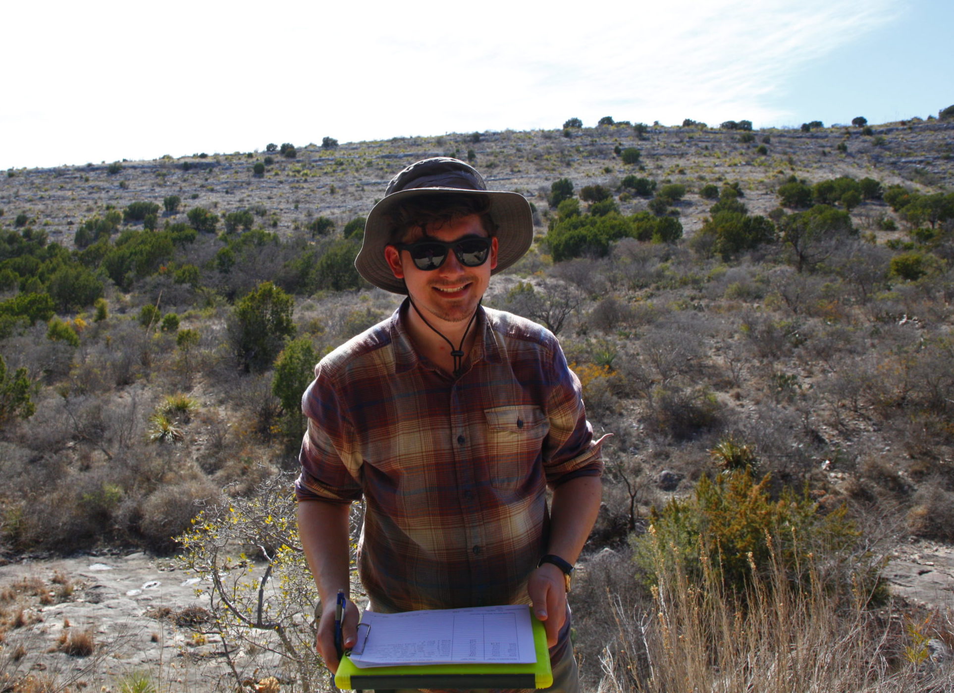 Rudy working on photo logs for the rock art sites at Hudspeth River Ranch.