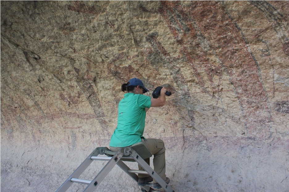 Dr. Carolyn Boyd using pXRF to analyze rock art at Rattlesnake Canyon.