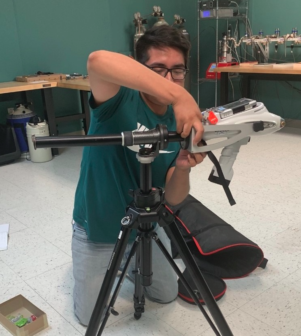 Shumla intern, Jesse Velasco, learning how to set up the pXRF with the tripod to get ready for field work.